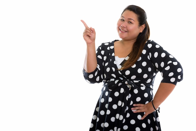 joven, feliz, gorda, mujer asiática, sonriente, con, vestido