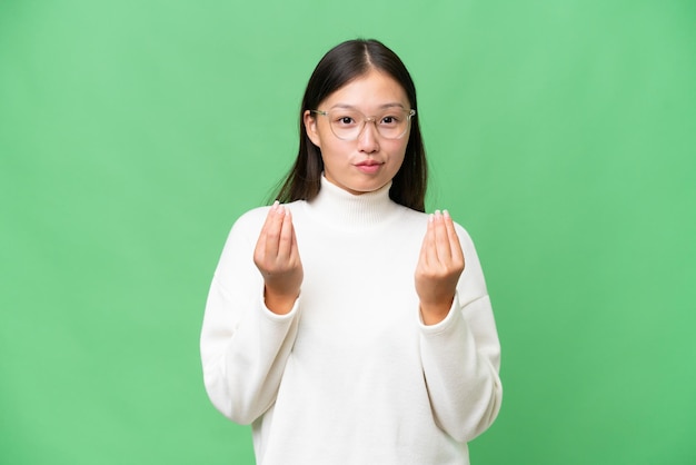 joven, mujer asiática, encima, aislado, plano de fondo, foco, cara, encuadre, símbolo