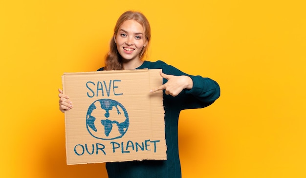 joven mujer rubia. salvar el concepto del planeta