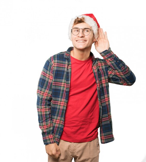 Joven en Navidad haciendo gestos