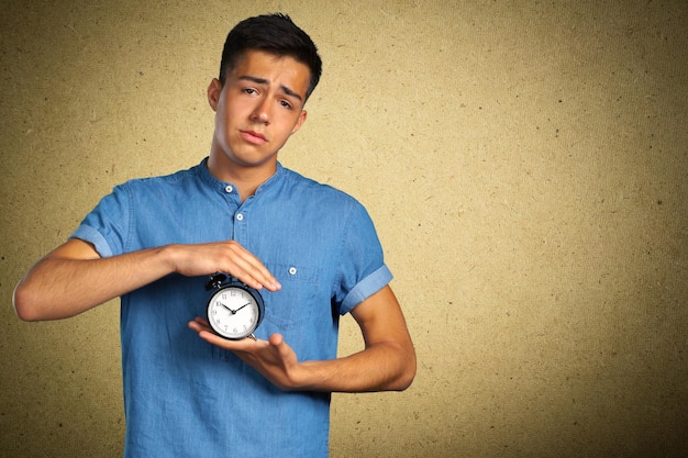 Joven, tenencia, un, despertador