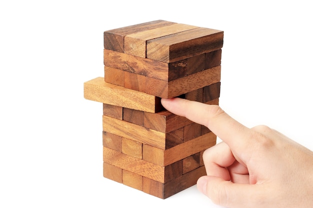 Juego de Jenga sobre un fondo blanco. Entretenimiento