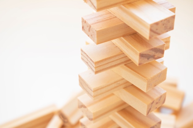 Foto juego de pila de bloques de madera con espacio de copia, fondo. concepto de educación, riesgo, desarrollo y crecimiento