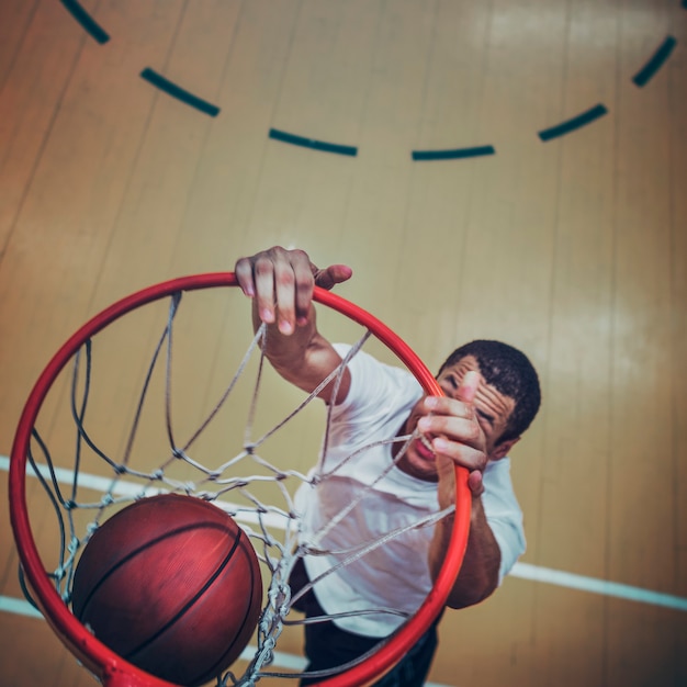 Foto jugador de baloncesto, hacer, un, slam dunk