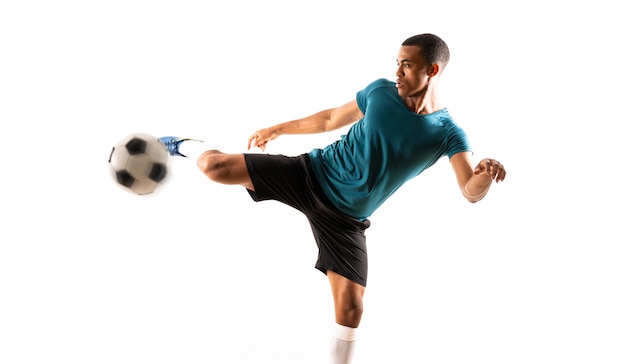 Foto jugador de fútbol afroamericano hombre blanco