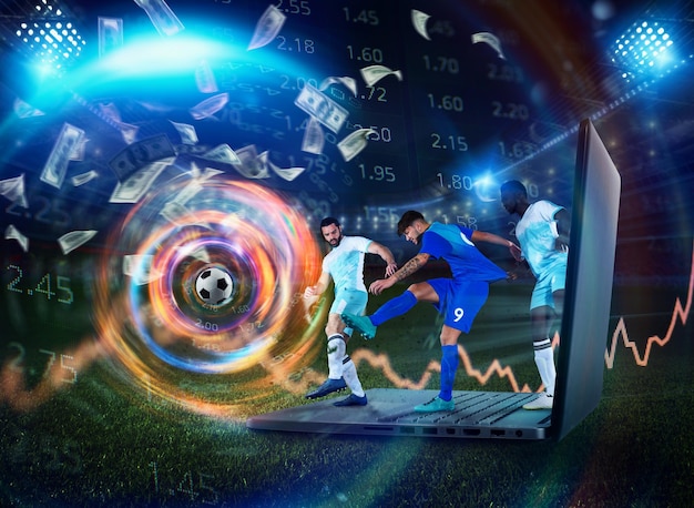El jugador de fútbol juega en un concepto portátil de apuestas en línea de fútbol