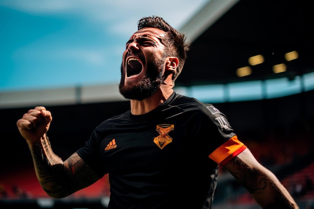 Un jugador de fútbol profesional celebrando después de marcar un gol durante un partido