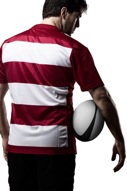 Jugador de rugby con uniforme rojo.