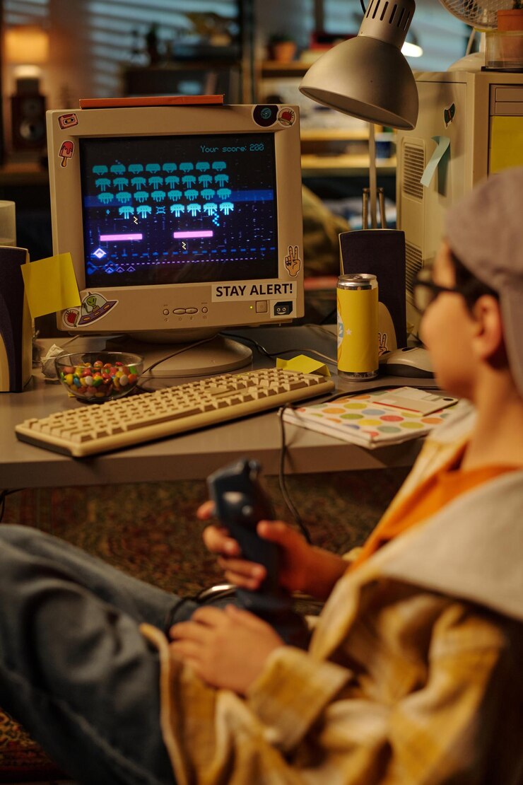 Foto jugando a videojuegos retro en una configuración de computadora antigua
