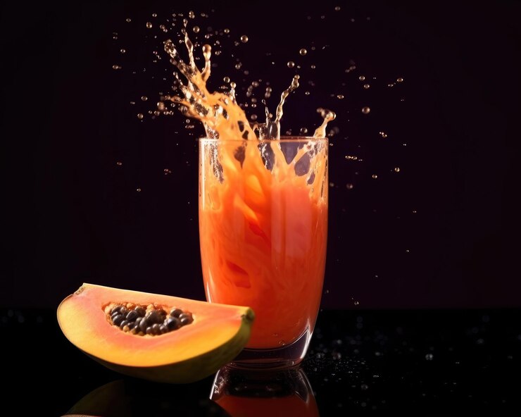 Jugo de papaya con fondo de estudio