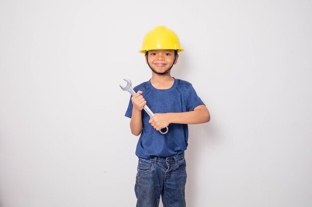 Foto junge mit gelbem hut ingenieur idee