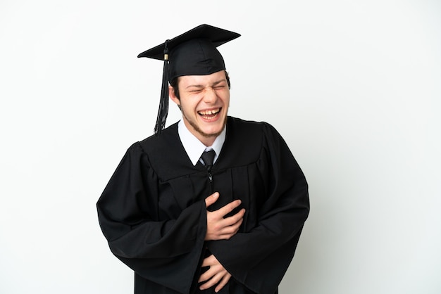 Junge russische Universitätsabsolventin isoliert auf weißem Hintergrund lächelt viel smiling