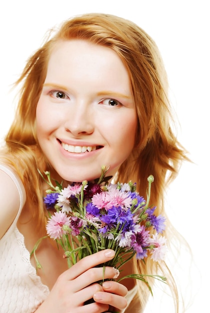 junge schöne Frau mit Blumen