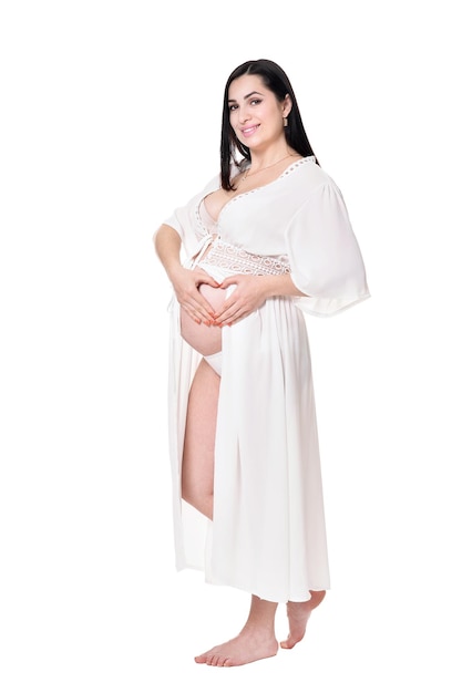 Junge schwangere Frau posiert isoliert auf weißem Hintergrund