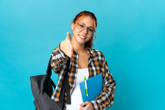 Junge Studentenperson über isoliertem Hintergrund