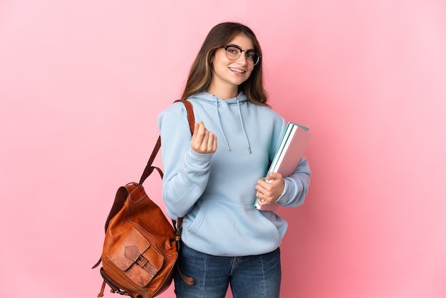 Junge Studentin isoliert, die Geldgeste macht