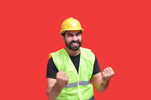 junger Bauarbeiter aufgeregt indisches pakistanisches Modell