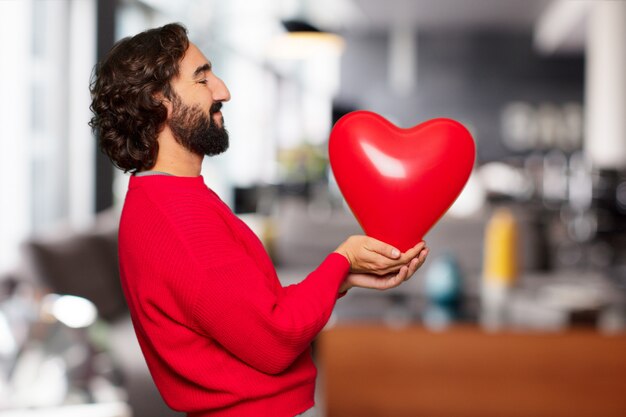 Junger verrückter Mann in der Liebe, Valentinstagkonzept.