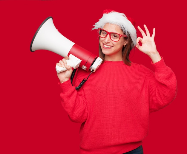 Junges hübsches Frauenweihnachtskonzept. bearbeitbarer Hintergrund