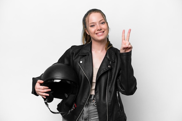 Junges kaukasisches Mädchen mit einem Motorradsturzhelm