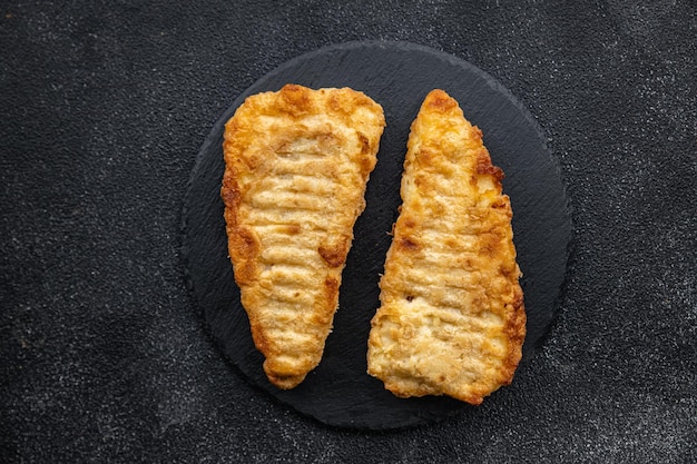 Kabeljau gebratener Fisch im Teig köstliche Meeresfrüchte gesunde Mahlzeit Essen Snack auf dem Tisch Kopie Raum Essen