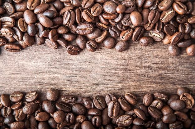 Kaffee Hintergrund Nahaufnahme Makro Viele Kaffeebohnen und Textfreiraum