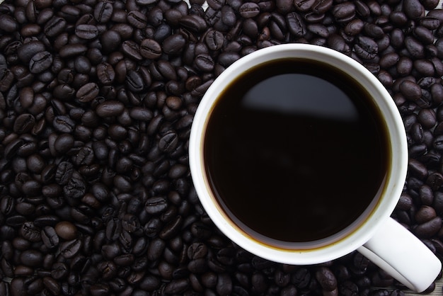 Kaffee in Tasse Kaffee, Kaffeebohne Hintergrund