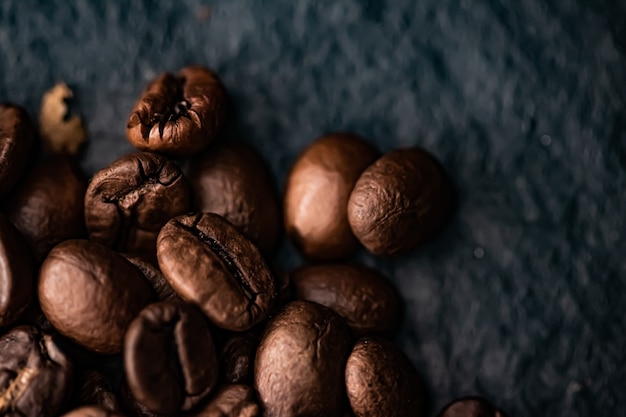 Kaffeebohnen hintergrund geröstete signaturbohne mit reichem geschmack bestes morgengetränk und luxusmischung