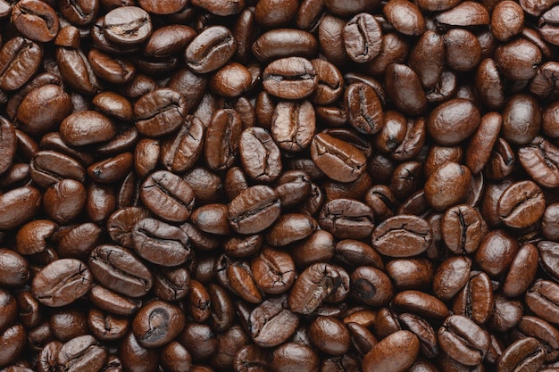 Kaffeebohnen Textur. Gerösteter Arabaca-Hintergrund. Ansicht von oben.