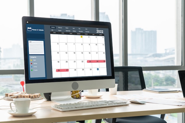Foto kalender auf computersoftwareanwendung für modische zeitplanplanung
