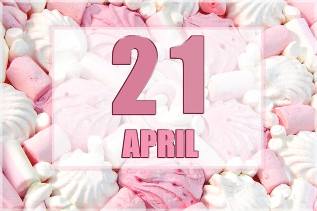 Kalenderdatum auf dem Hintergrund von weißen und rosa Marshmallows Der 21. April ist der einundzwanzigste Tag des Monats