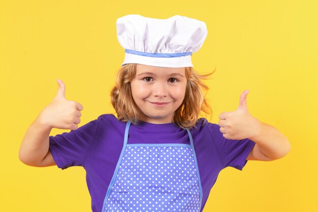 Kid chef cook retrato de estudio Niños cocinando Kid boy con delantal y gorro de chef