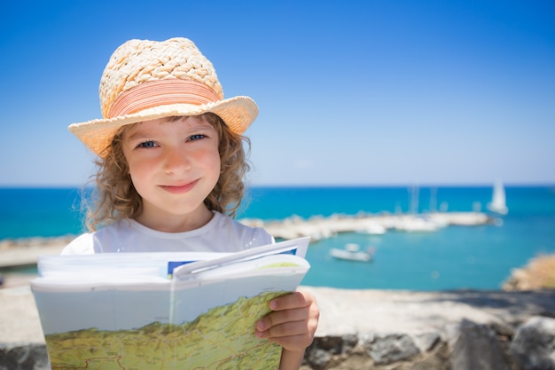 Kind am Strand Sommerferienkonzept