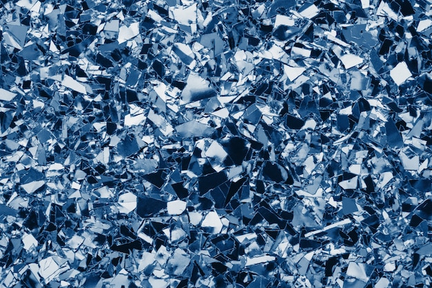 Klassischer Konfetti-Hintergrund der blauen Folie