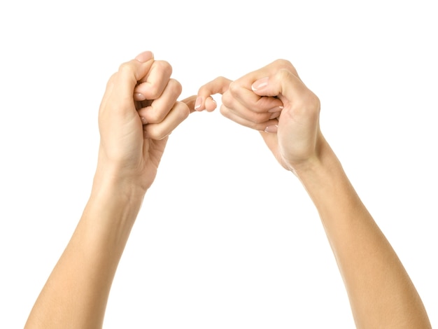 Kleine Finger halten sich gegenseitig. Frauenhand mit französischem Maniküregestikulieren lokalisiert auf weißem Hintergrund. Teil der Serie