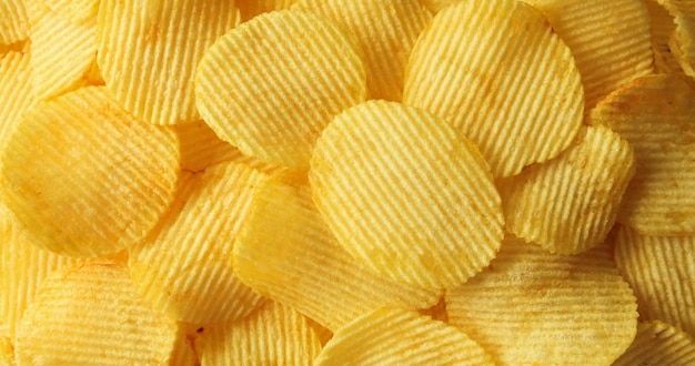 Foto knusprige kartoffelchips, snack-textur, hintergrund, nahaufnahme, draufsicht