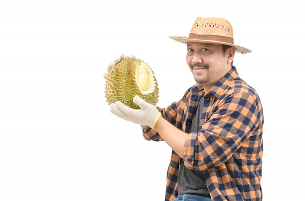 König der Frucht in Thailand, asiatischer Mann Bauer, der Mon Thong Durian hält