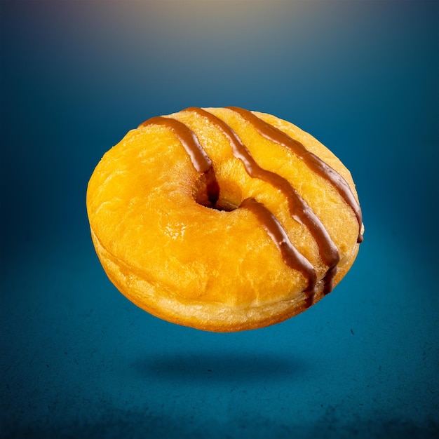 Foto köstlicher donut auf blauem, süßem fast-food-konzept