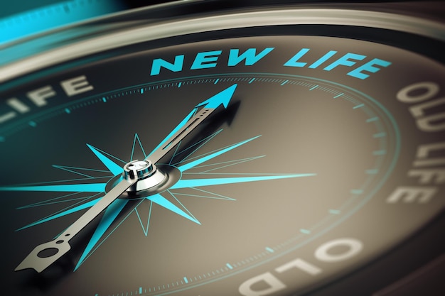 Kompass mit Nadel, die das Wort neues Leben zeigt, Konzeptbild zur Veranschaulichung des Änderungsmotivationskonzepts.