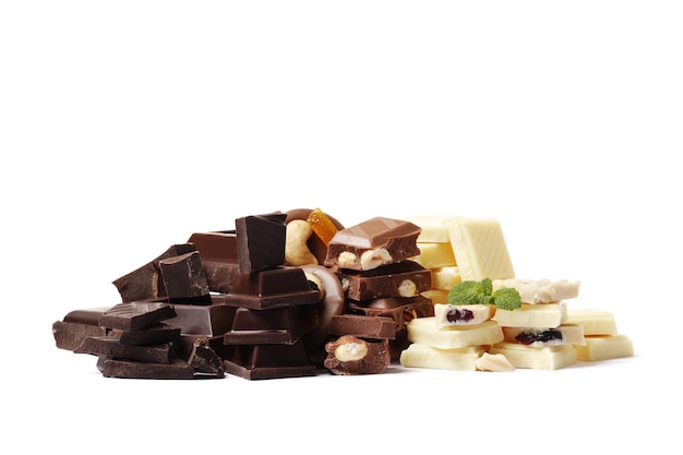 Komposition mit unterschiedlicher Schokolade auf einem weißen Hintergrund. Weiße, Milch, dunkle Schokolade.