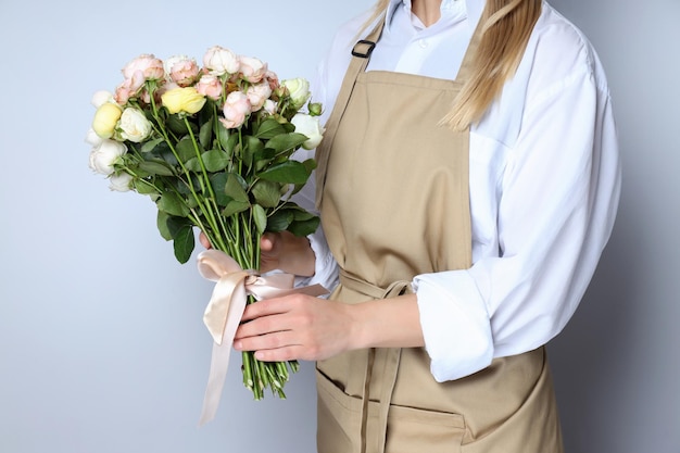 Konzept der Blumenladenlieferung und des Floristen