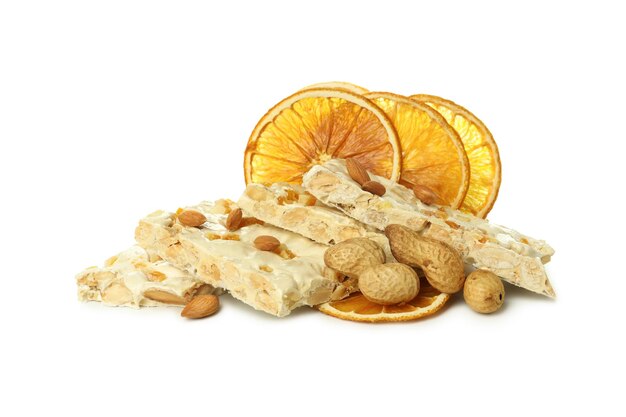 Konzept des schmackhaften Lebensmittelnougat lokalisiert auf weißem Hintergrund