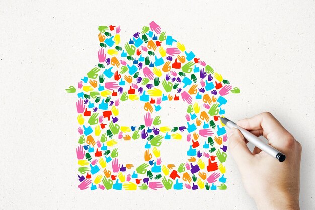 Kreative gezeichnete Handgeste Haussymbol auf weißem Hintergrund Immobilien- und Hypothekenkonzept