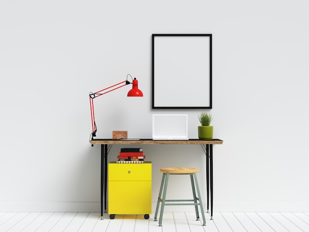 Kreativer Arbeitsbereich-Schreibtisch mit Plakatrahmen-Spott oben