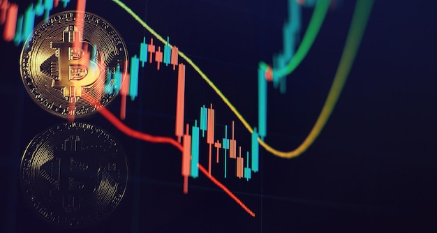 Kryptowährung Bitcoin Goldmünze und defokussierter Diagrammhintergrund