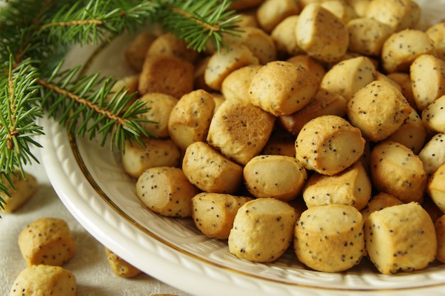 Kuciukai ou Slizikai são biscoitos tradicionais da véspera de Natal da Lituânia servidos na ceia de Natal na Lituânia Kuciukai são comidos com leite de papoula