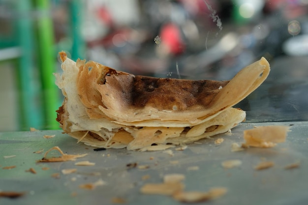 kue leker ou lekker. crepes tradicionais à base de farinha, ovos, chocolate, banana, leite açucarado.