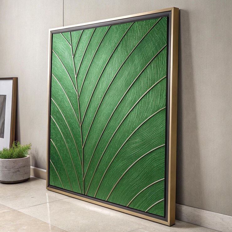 Kunstwerk aus grünem Blatt mit goldenem Rahmen