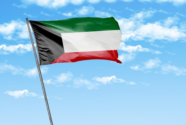 kuwait bandera ondeante 3D en un cielo azul con imagen de fondo de nubes