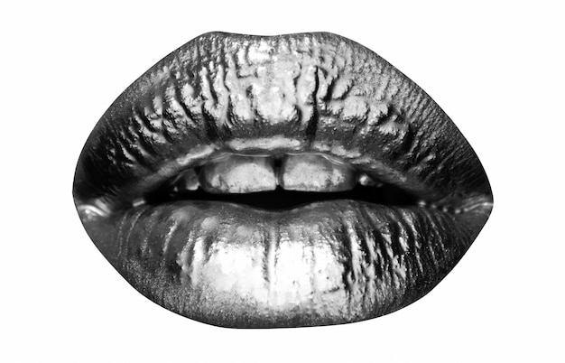 Foto los labios dorados el brillo dorado de los labios sexy la boca metálica la belleza de la mujer el maquillaje de cerca los labios metálicos dorados